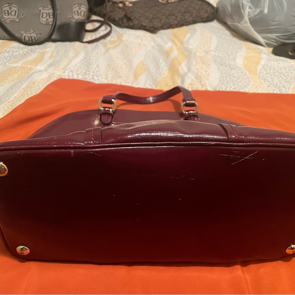 This is a used bag with a couple of scratches as shown. But good condition. - Picture 7 of 10